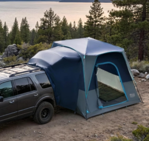 TIMBER RIDGE SUV Tent set up at a campsite with a vehicle
